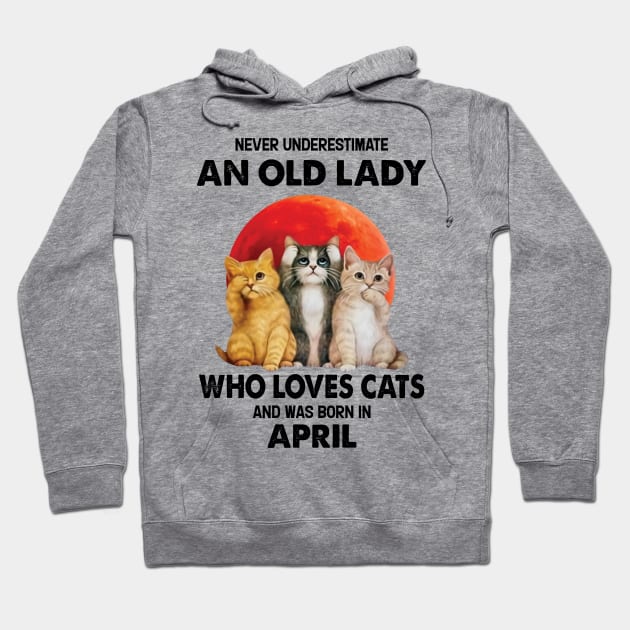 Never Underestimate An Old Lady Who Loves Cats And Was Born In April Hoodie by Bunzaji